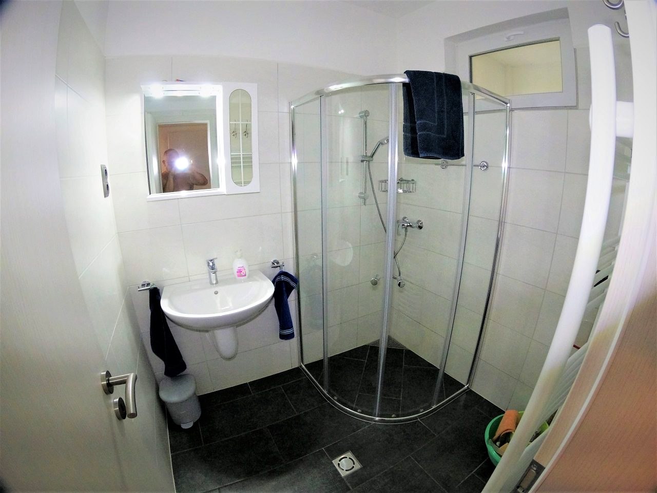 The ground-floor bathroom with a shower cabin