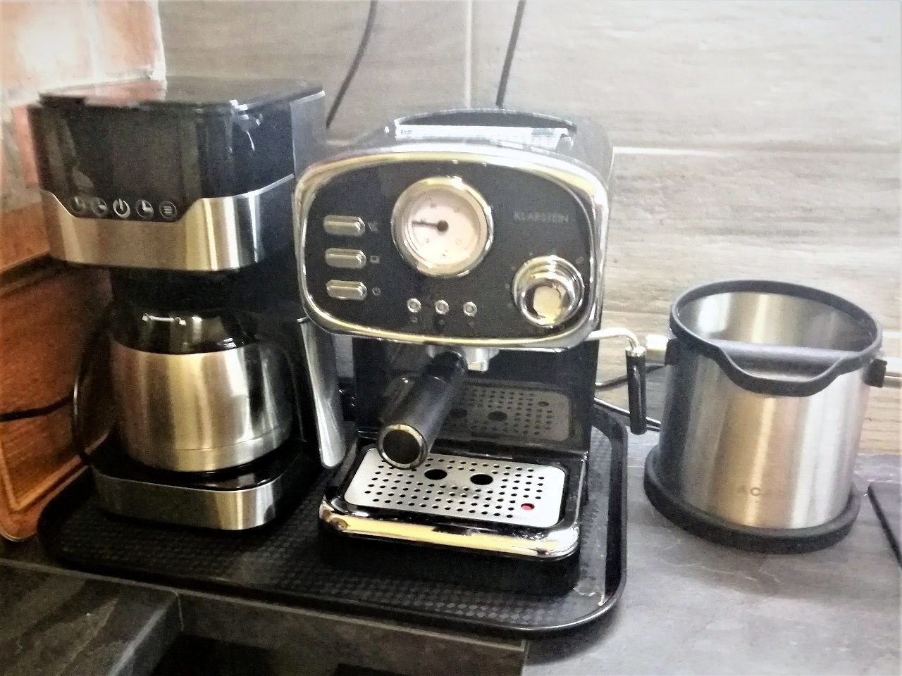 Coffee maker and kettle on the kitchen counter
